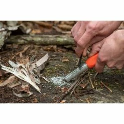 Adventure Medical Kits SOL Mag Striker With Tinder Cord 8 Adventure Medical Kits SOL Mag Striker With Tinder Cord -Climbing Accessories Outlet Shop 0140 1241 sol mag striker close up scraping magnesium off rsz 70105.1626823516