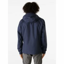 Arc'teryx Beta Jacket - Men's (Fall 2022) 14 Arc'teryx Beta Jacket - Men's (Fall 2022) -Climbing Accessories Outlet Shop Beta Jacket Black Sapphire Back View rsz 52565.1668197959.1280.1280 03375.1674262360