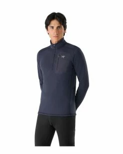 Arc'teryx Rho Heavyweight Zip Neck - Men's 9 Arc'teryx Rho Heavyweight Zip Neck - Men's -Climbing Accessories Outlet Shop Rho Heavyweight Zip Neck Black Sapphire Front View 01362.1675201748
